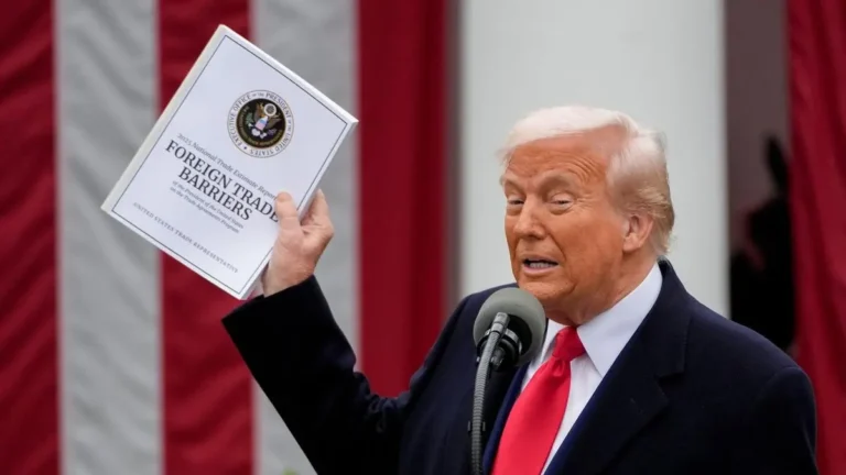 Donald Trump addressing the media during the 2025 trade policy update, emphasizing tech product exemptions